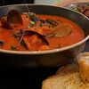 Фото к позиции меню Средиземноморский томатный суп с морскими гадами