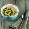 Фото к позиции меню Крем-суп из зеленых овощей с песто и кедровыми орехами