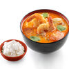 Фото к позиции меню Суп Том Ям с креветками, куриной грудкой и рисом