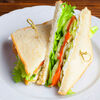 Фото к позиции меню Сэндвич с лососем слабой соли и свежим салатом