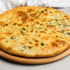 Фото к позиции меню Хачапури со шпинатом и сыром