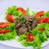 Фото к позиции меню Теплый салат Тбили из куриной печени
