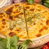 Фото к позиции меню Хачапури со шпинатом и сыром сулугуни