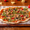 Фото к позиции меню Пицца с креветками, беконом и рукколой