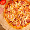 Фото к позиции меню Пицца Мясная Де Люкс