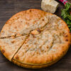 Фото к позиции меню Осетинский пирог с сыром и свекольными листьями Цахараджын