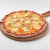 Фото к позиции меню Ржаная пицца Четыре сыра