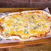 Фото к позиции меню Пицца Четыре сыра на томатной основе