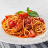 Фото к позиции меню Спагетти с томатами черри и базиликом