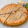 Фото к позиции меню Осетинский пирог с сыром и свекольными листьями