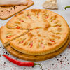 Фото к позиции меню Осетинский пирог с курицей, сыром и болгарским перцем