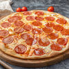 Фото к позиции меню Пицца Двойная пепперони с хрустящим бортом