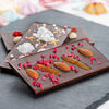 Фото к позиции меню Плитка шоколадная с пекинским орехом и вафельной крошкой