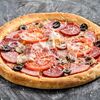 Фото к позиции меню Пицца Мясное изобилие