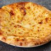 Фото к позиции меню Пирог с сыром и картофелем