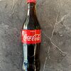 Фото к позиции меню Coca-Cola оригинал в стекле
