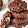 Фото к позиции меню Печенье Cookievruki шоколадное с фундуком, молочным и белым шоколадом