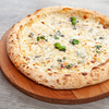 Фото к позиции меню Неаполитанская пицца Сорок четыре сыра