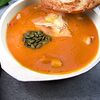 Фото к позиции меню Тыквенный крем-суп с тигровыми креветками