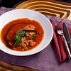 Фото к позиции меню Густой томатный суп с дарами моря