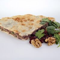 Осетинский пирог с фасолью, грецким орехом и кинзой