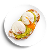 Фото к позиции меню Тост с яйцами пашот и гуакамоле