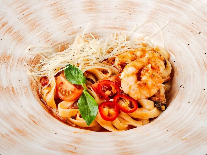 Как приготовить спагетти с морепродуктами в сливочном соусе. Пошаговый рецепт с фото