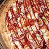 Фото к позиции меню Пицца Ветчина/печеный перец/томат