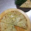 Фото к позиции меню Пирог осетинский с сыром и зеленью