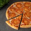 Фото к позиции меню Пицца Маргарита с томатами
