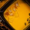 Фото к позиции меню Тыквенный крем-суп с трюфельной эспумой