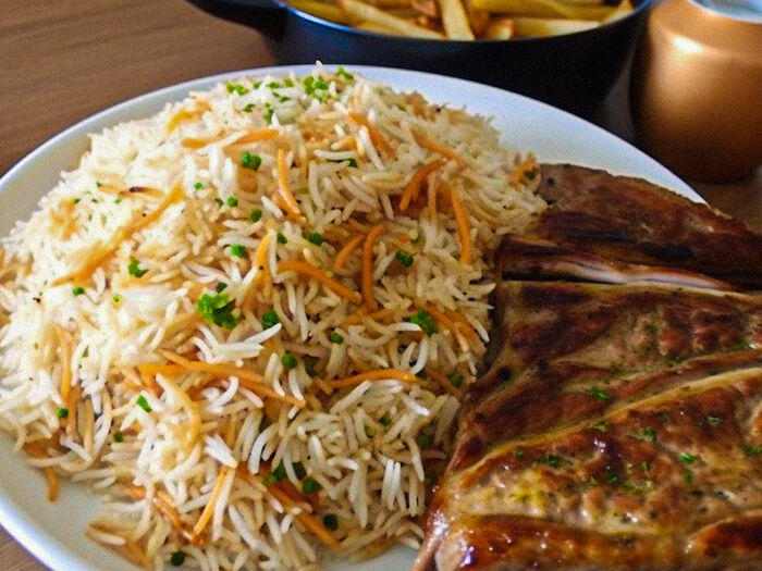 Rice, pasta, wedges and fries with t-bone