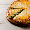 Фото к позиции меню Осетинский пирог с зеленью и сыром