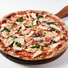 Фото к позиции меню Пицца с осьминогом и мини шпинатом на ржаном тесте