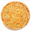 Фото к позиции меню Пицца Четыре Сыра средняя