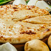 Фото к позиции меню Осетинский пирог с сыром и картофелем 30 см