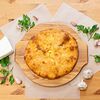 Фото к позиции меню Осетинский пирог с сыром и чесноком