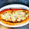Фото к позиции меню Пицца с телятиной, вялеными томатами и сыром сулугуни