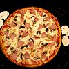 Фото к позиции меню Пицца с ветчиной и грибами M
