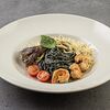 Фото к позиции меню Неро спагетти с морепродуктами и соусом