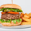 Фото к позиции меню Гамбургер с говяжьей котлетой и перчиком халапеньо