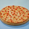 Фото к позиции меню Пицца «Маргарита» на тонком тесте 30 см