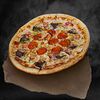 Фото к позиции меню Мясная пицца с перцем халапеньо