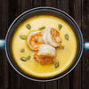 Фото к позиции меню Сливочный крем-суп из тыквы с креветками