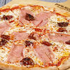 Фото к позиции меню Пицца Прошутто с вялеными томатами (28 см)