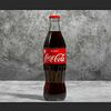 Фото к позиции меню Кока-Кола в стеклянной бутылке