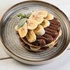 Фото к позиции меню Панкейк с шоколадной пастой Nutella и бананом