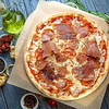 Фото к позиции меню Пицца с мясными итальянскими деликатесами