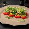 Фото к позиции меню Салат с осьминогом и овощами по-критски
