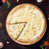 Фото к позиции меню Пицца бьянка Четыре сыра